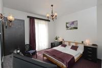 Gustige hotelkamer van Hotel Budai dichtbij het knooppunt Bach