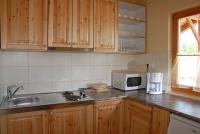Well-equipped kitchen in the Bungalow Aqua Spa at Cserkeszolo - online room booking