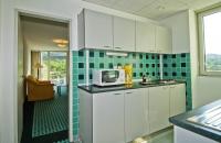 Modern konyha a Budakeszi úton - Superior apartman konyhája a hotel Európában Modern konyha a Budakeszi úton - Superior apartman konyhája a hotel Európában