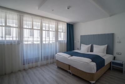 Hotel Civitas - номер в двухспальной кроватью по сниженным ценам - ✔️ Hotel Civitas Sopron**** - акция на номера отеля в центре города Шопрон
