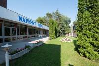 Hotel Napfeny surrounded by a green park in Balatonlelle