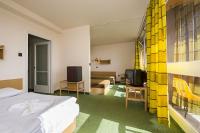 Mooie en ruime hotelkamer van het Hotel Napfény in Balatonlelle met gunstige halfpension