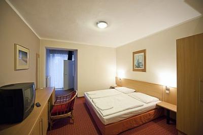 Chambre d'Hôtel spéciale á l'Hôtel Lido - chambres familiales au prix spécial en Óbuda - Lido Hôtel Budapest - Bord Romain hôtel au prix spécial de 3 étoiles á la rive du Danube, pres de l'Aquincum