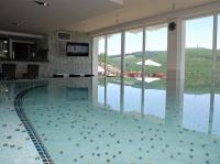Wellness pool with panoramic view to Kekesteto in Hotel Ozon Residence