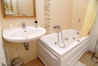 Bathroom with jacuzzi in the apartment of Hotel Panorama in the downtown of Eger